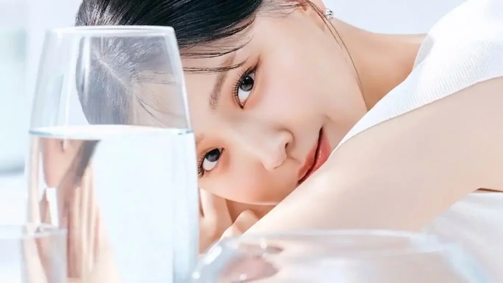 A woman with glowing, clear skin reflecting the hydration and radiance benefits of modern skin booster treatments.