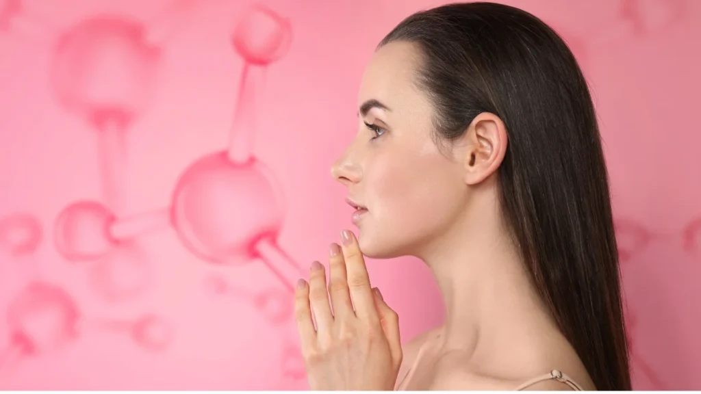 Image of a woman’s profile with a pink digital background