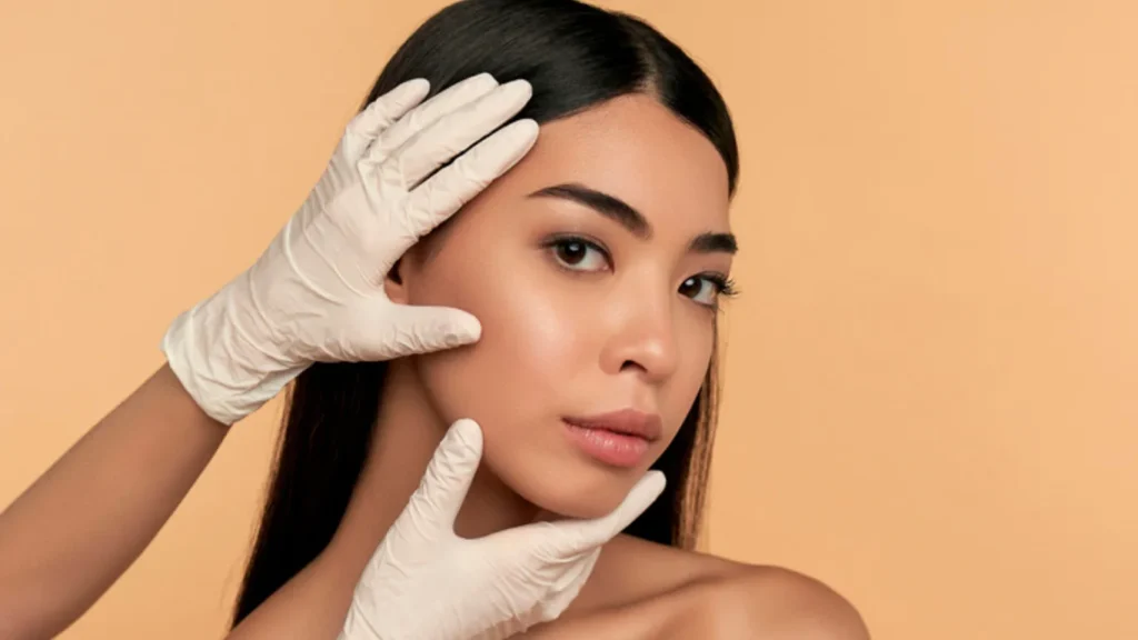Face of a woman being held by a Doctor or a Nurse