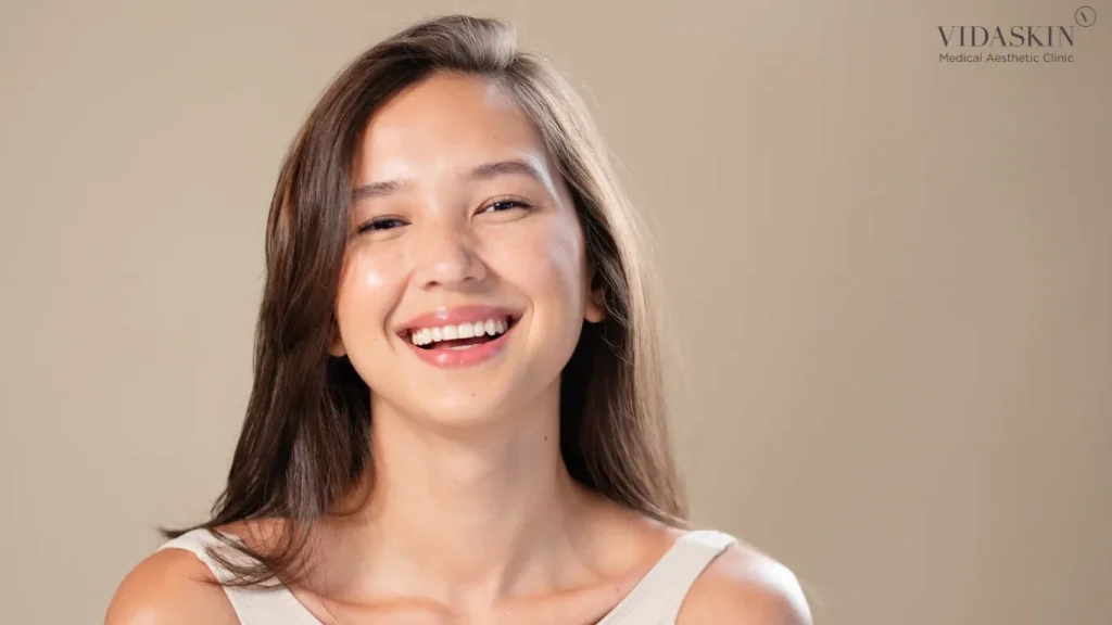 Photo of a woman smiling at the camera