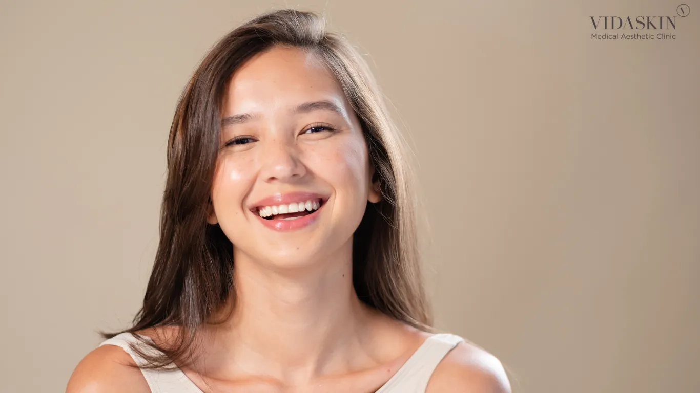 Photo of a woman smiling at the camera